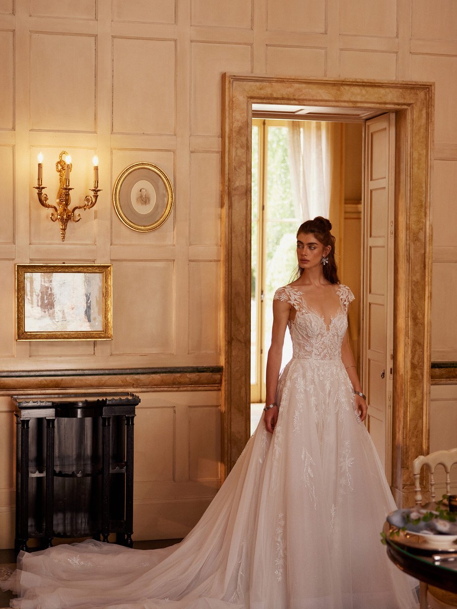 Embroidered tulle A-line gown in a marble hall